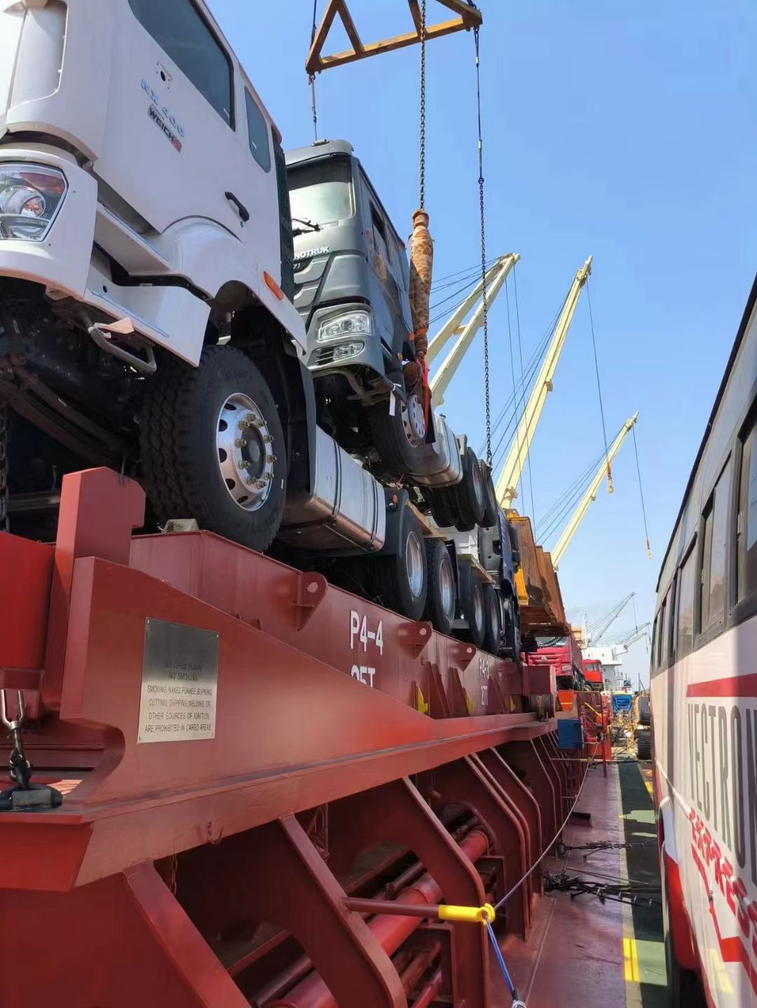 Truck tractor heads stowed side by side on deck flats (P4-4)