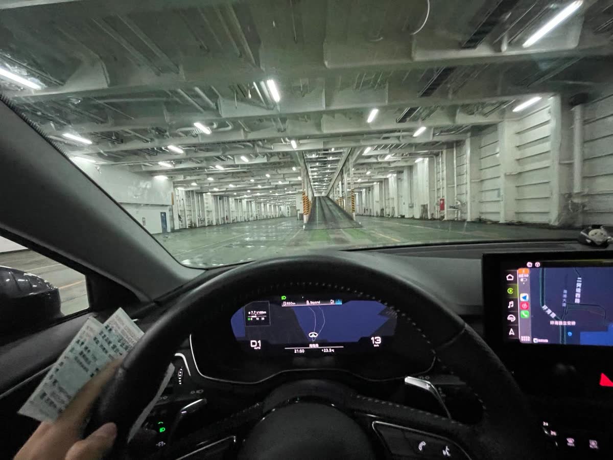 Driver view from inside a car along the interior ramp of a RoRo vessel